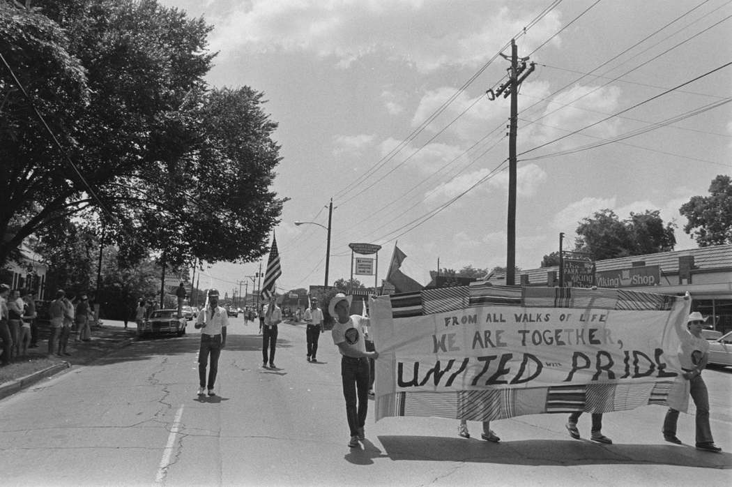 #39 People Walking With Banner in Parade, 1979.