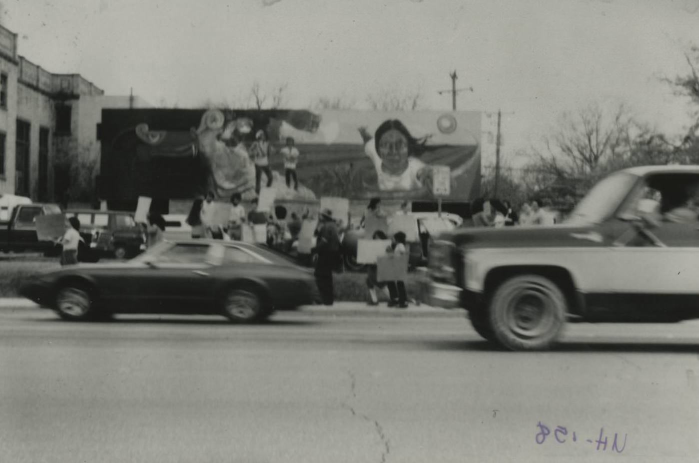 #58 A protest to save Juarez-Lincoln University and mural (by Raul Valdez) at East 1st Street and I-35 in Austin, 1979