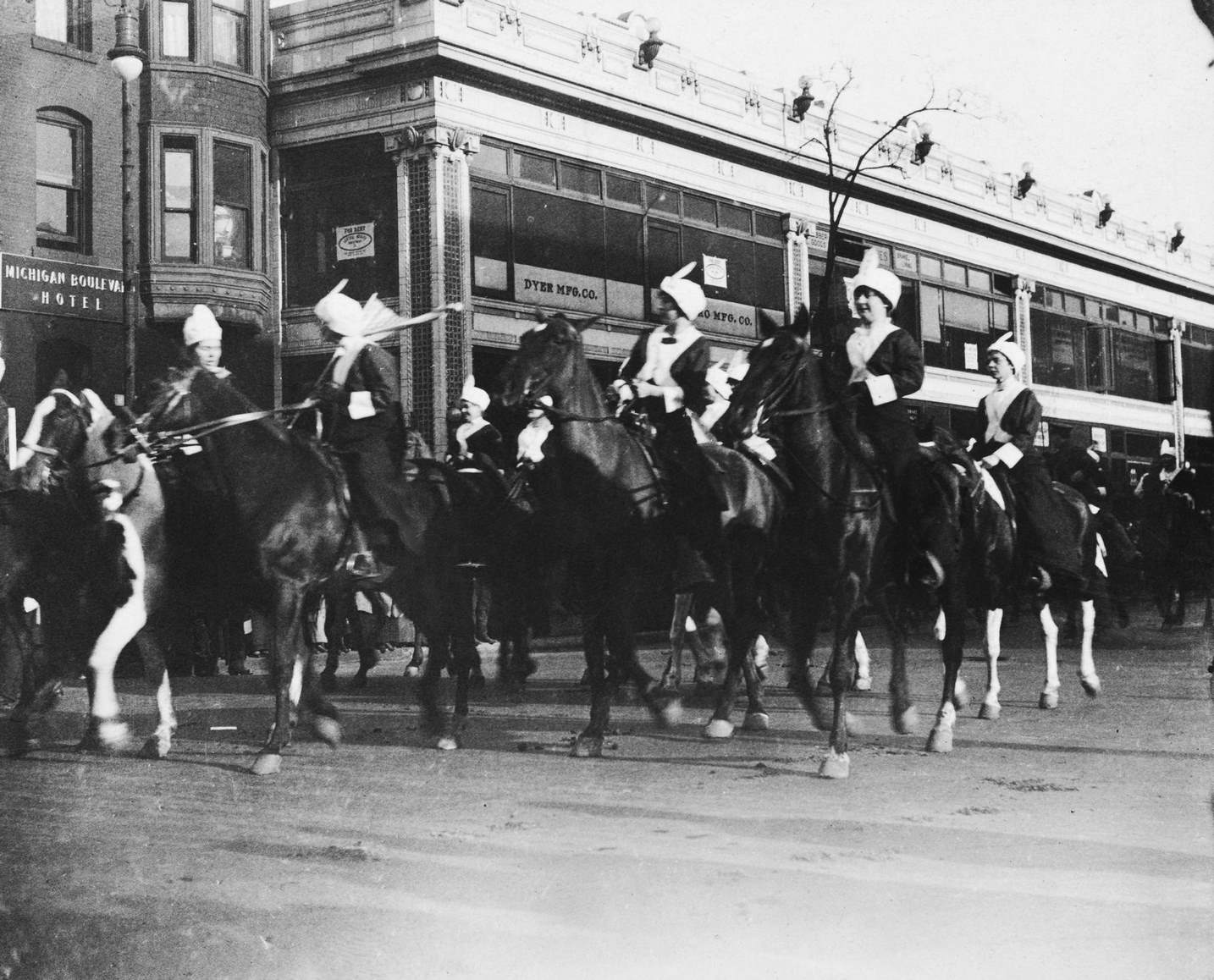 #111 Suffragettes on horseback during a parade on Ingleside Ave, Chicago, 1915.