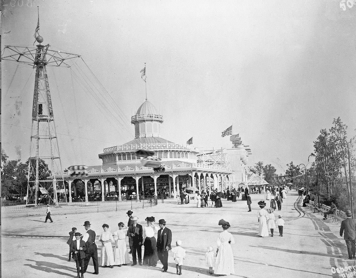#159 Scene at Riverview amusement park with carousel in background, Chicago, Illinois, 1910s.