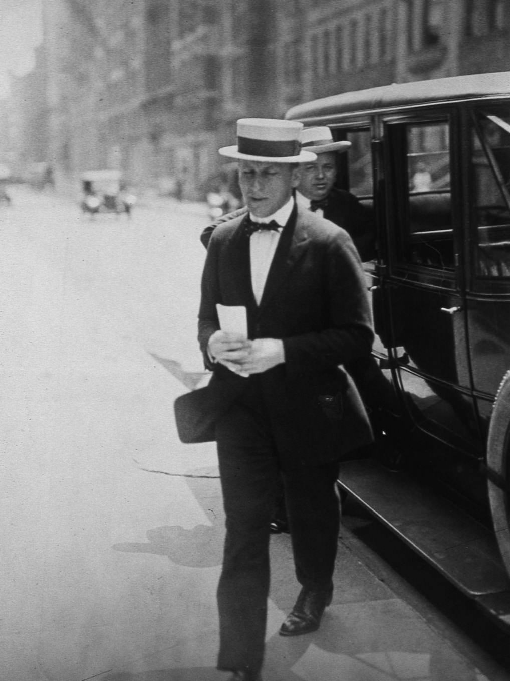 #54 Arnold Rothstein, the gambler who set up the Black Sox scandal during the 1919 World Series in Chicago, is photographed exiting a car in Chicago, 1919.