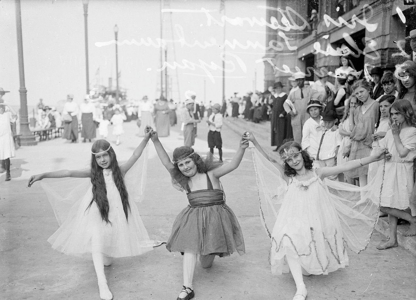 #31 Elsie Tannenbaum, Iris Stewart and Harriet Ryan, wearing costumes and posing for a children’s play at Municipal Pier (Navy Pier), Chicago, Illinois, 1917.