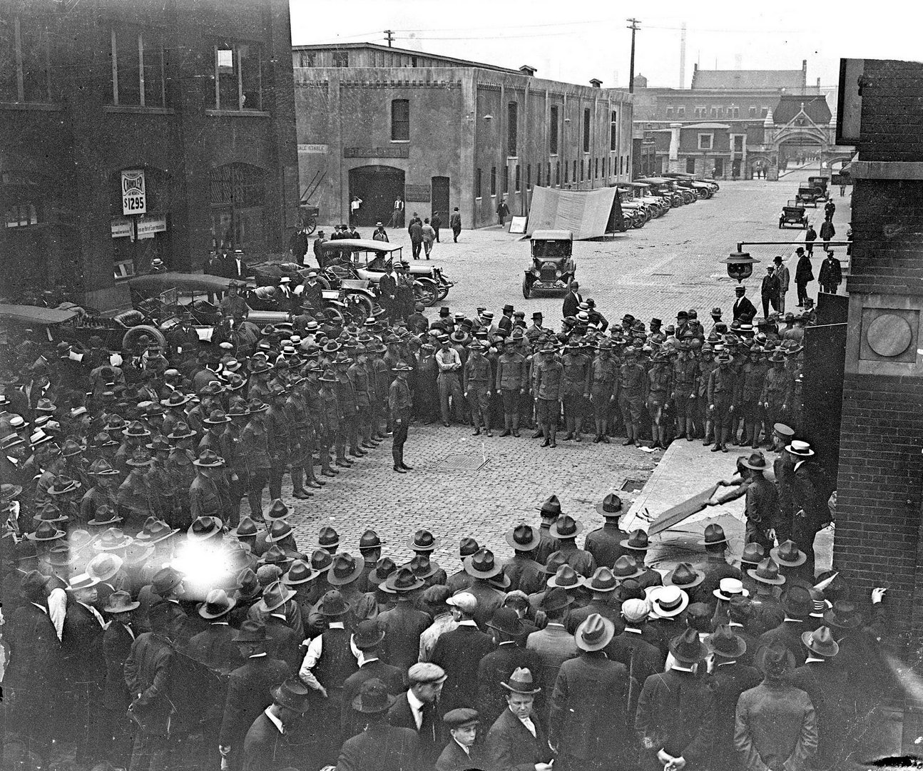#75 Soldiers of Battery D of the Illinois National Guard, gathered at the stockyards on Exchange Avenue in the New City community area, Chicago, Illinois, June 30, 1916.