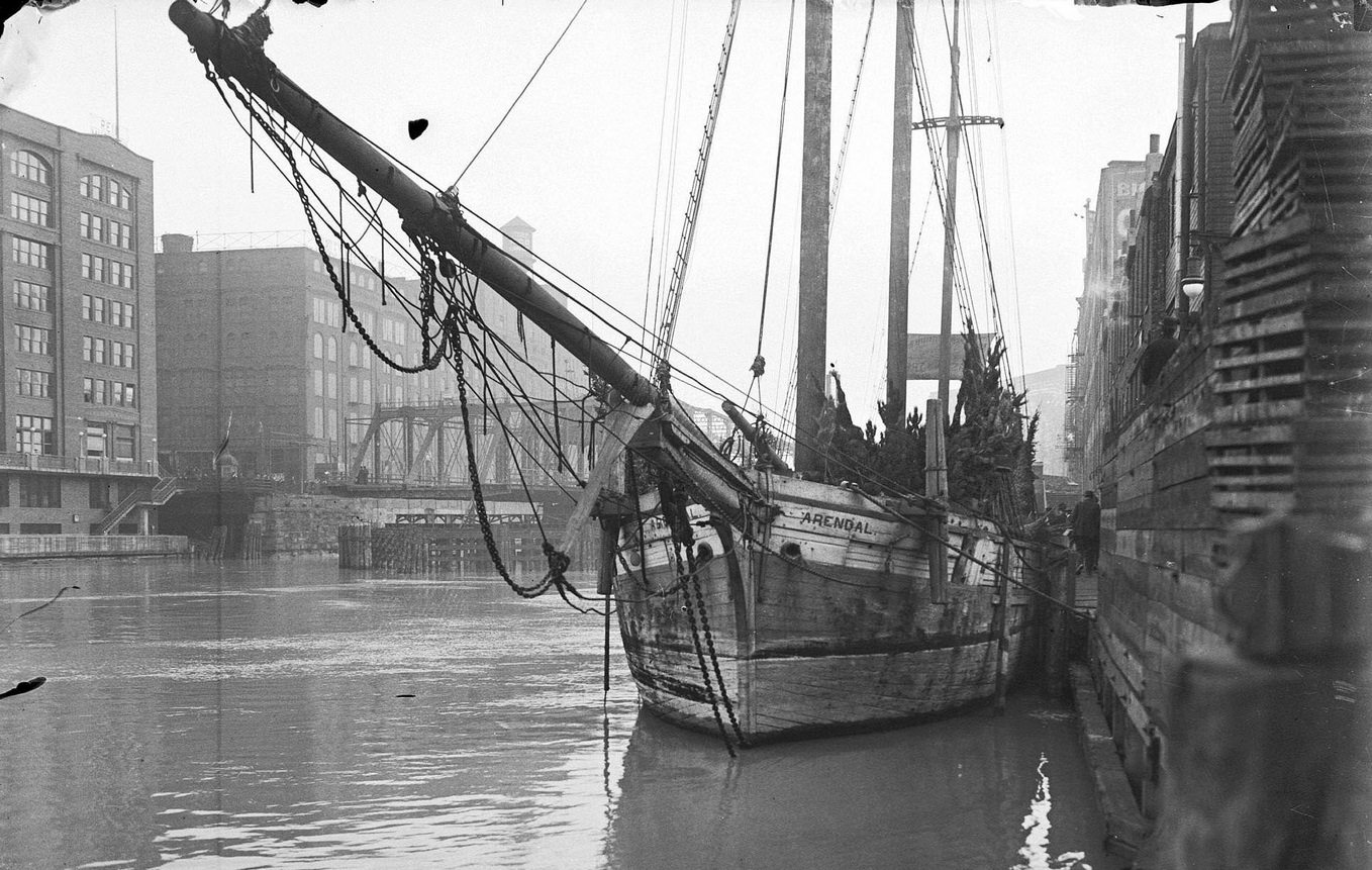 #6 Schooner Arendal, docked at Clark Street, to deliver Michigan-grown Christmas trees, Chicago, Illinois, December 3, 1914.