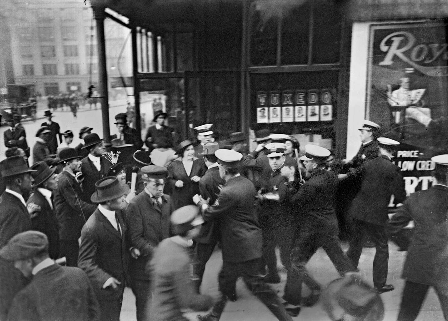 #88 Striking garment workers and policemen scuffle in Chicago, Illinois, 1915.