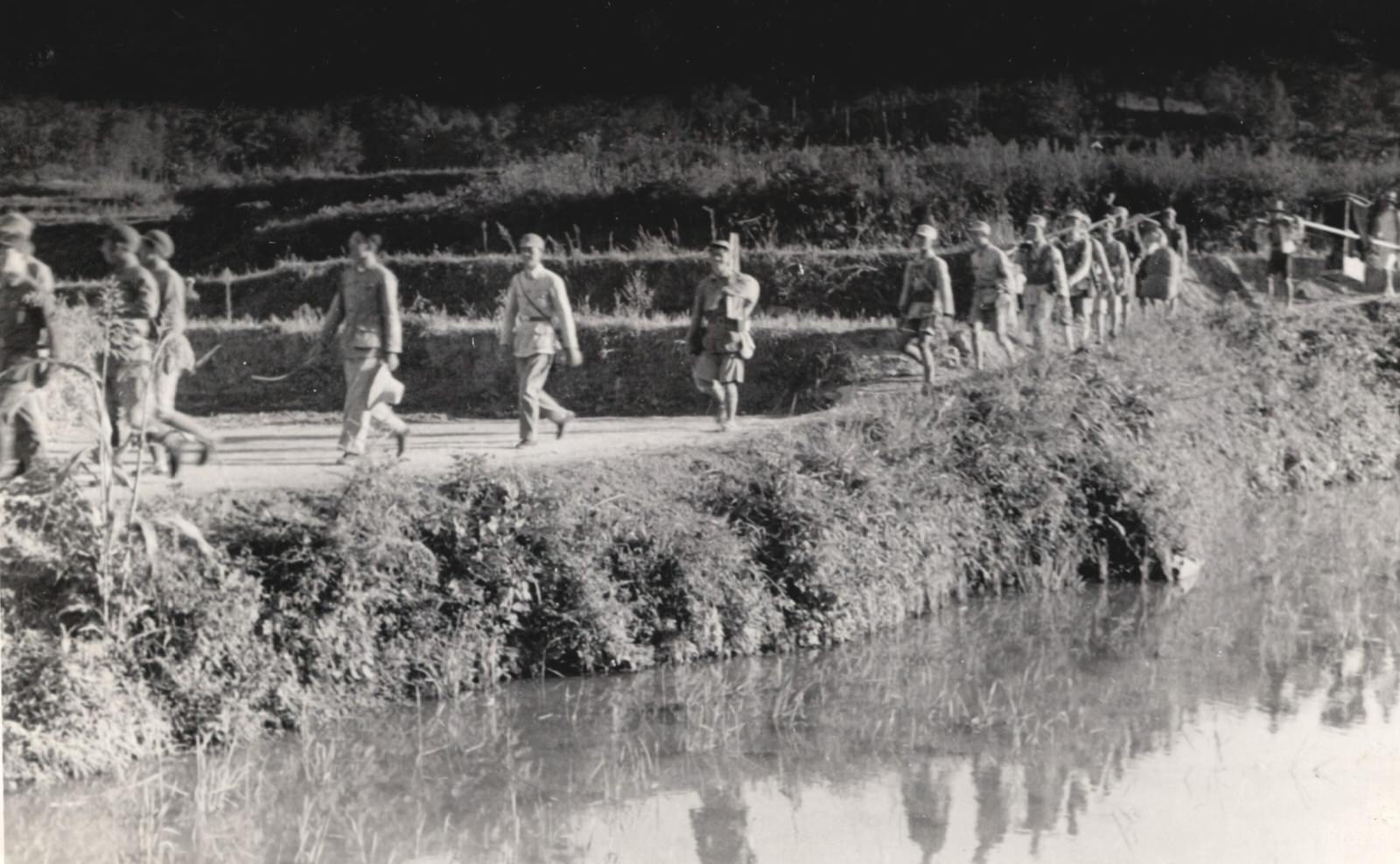 #132 Armed soldiers marching. 1937-1940
