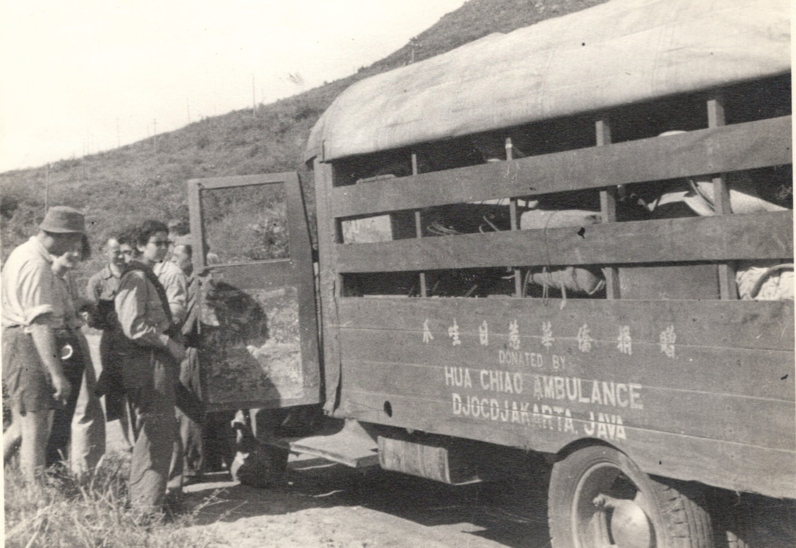 Ambulance of Chinese Red Cross Medical Corps – Dr. Eva Ho Tung in the foreground. 1937-1940