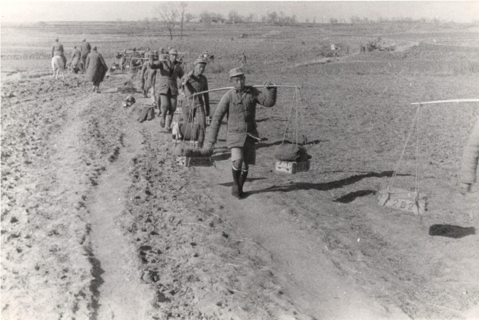 #28 The paths of Central China are filled with men and animals carrying ammunition up to the front. 1937-1940