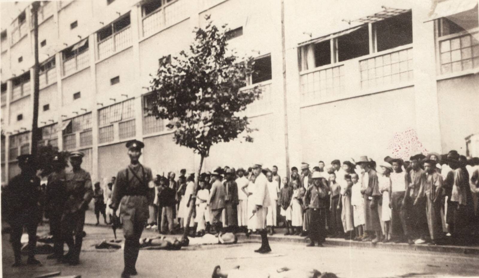 #35 Unidentified group of civilians with army officers in foreground. 1937-1940