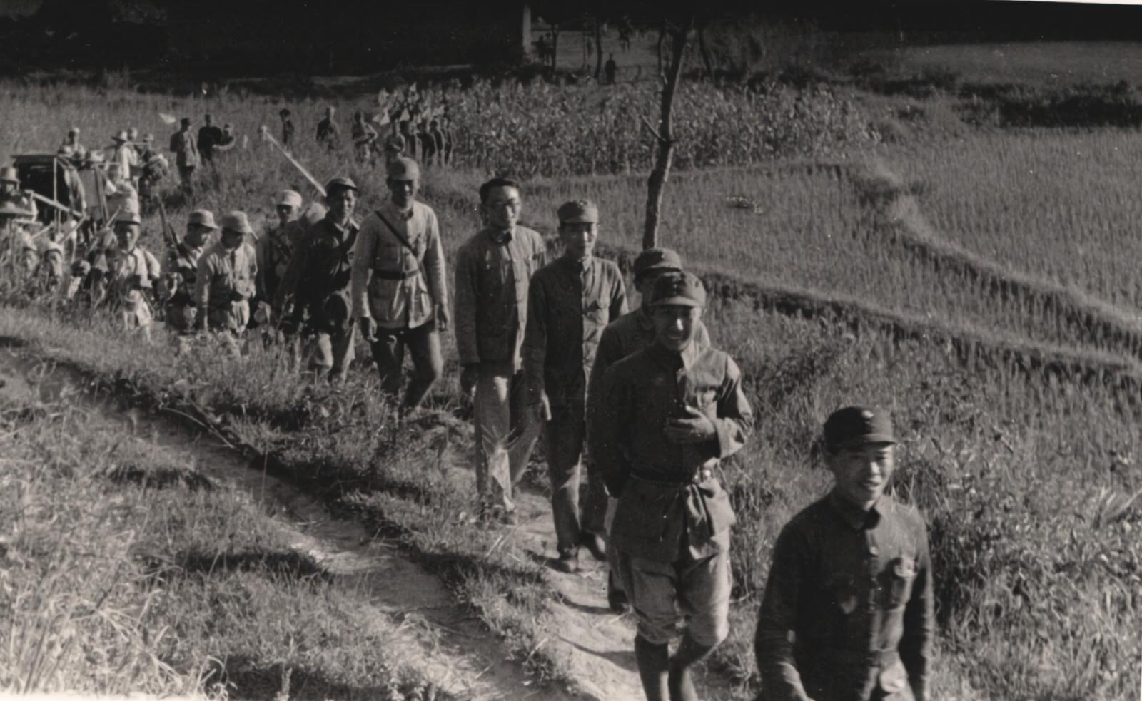 #74 Various civilian and military persons.