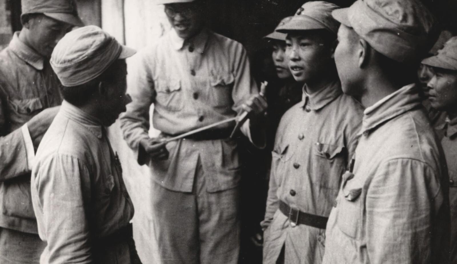 #75 Various civilian and military persons.