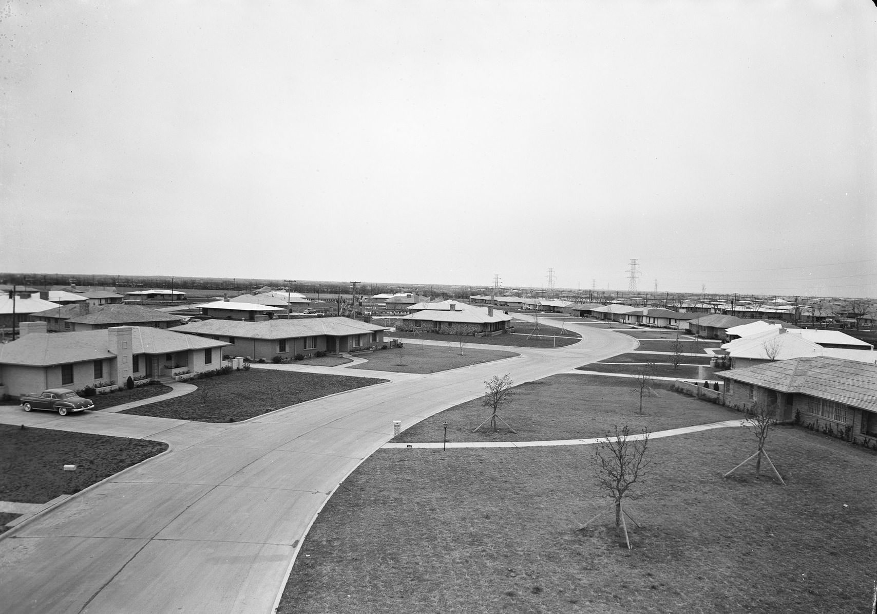 #168 Ranch style homes, residential street, possibly Wynnewood subdivision, Oak Cliff area, Dallas, Texas, 1954