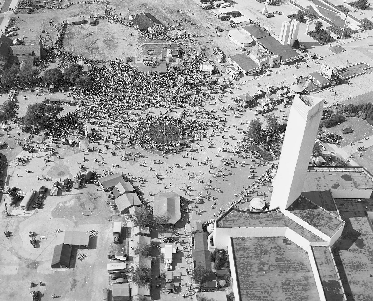 #210 Aerial photograph of trapeze artists performing at Fair Park, Dallas, Texas, 1950