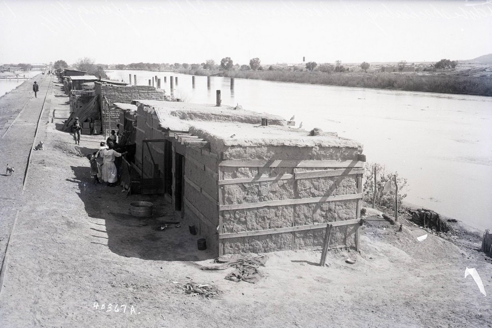 #68 View of El Paso, looking North from International Bridge showing Mexican quarters, 1909