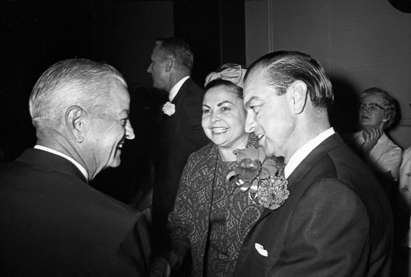 #109 Arlington Mayor Tom J. Vandergriff and his wife, Anna, conversing with an attendee of an appreciation dinner held in Vandergriff’s honor in Hotel Texas’ Grand Ballroom, 1966