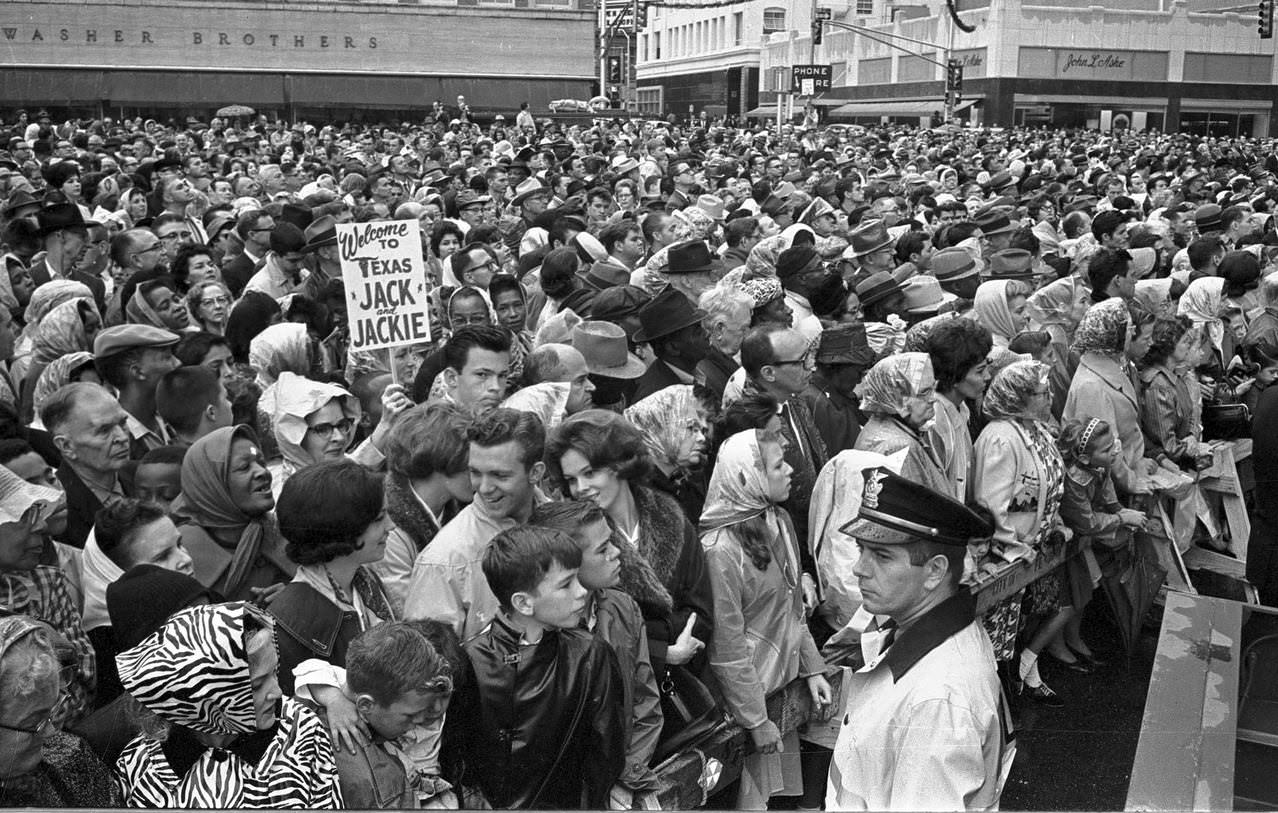 #128 Crowd gathered to hear John F. Kennedy speak, 1963