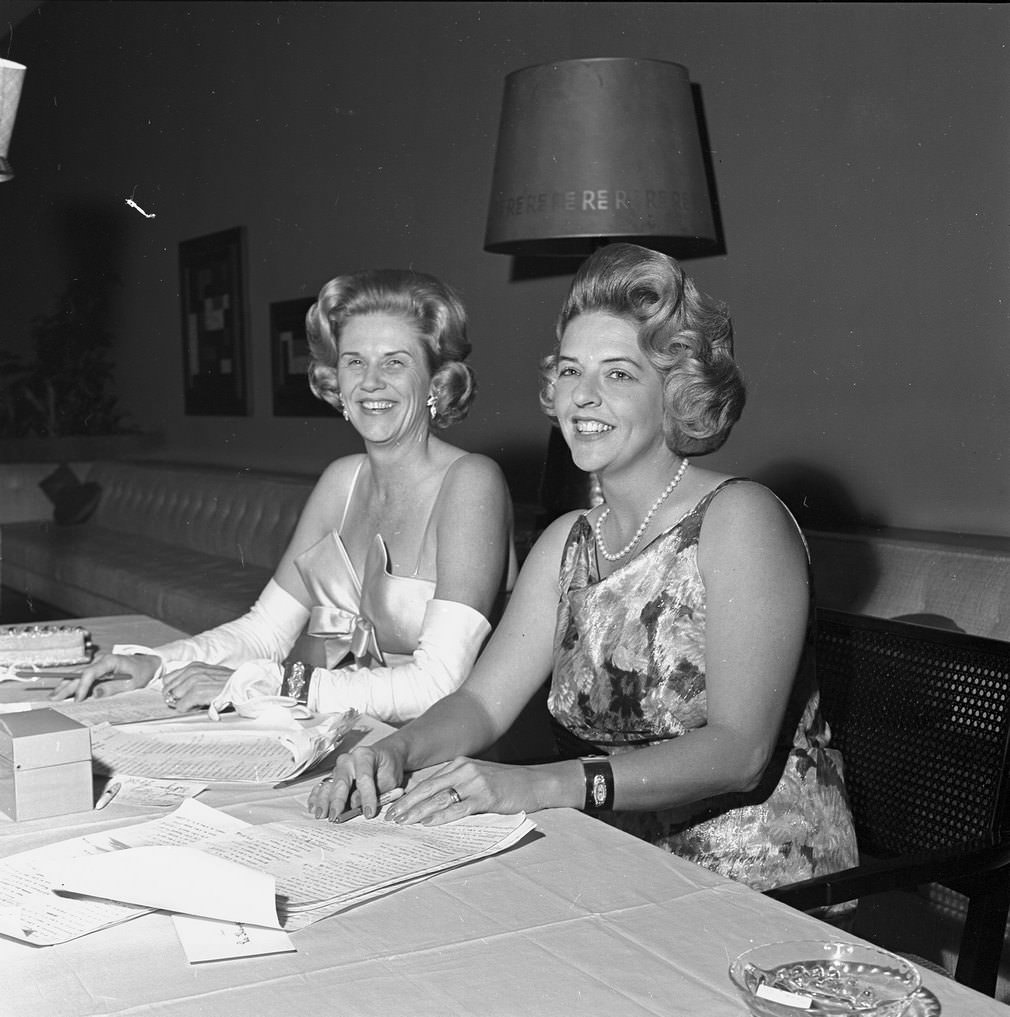 #132 Mrs. W. K. Gordon Jr. with Mrs. James M. Harrison taking tickets at The Assembly Ball, Ridglea Country Club, Fort Worth, 1961