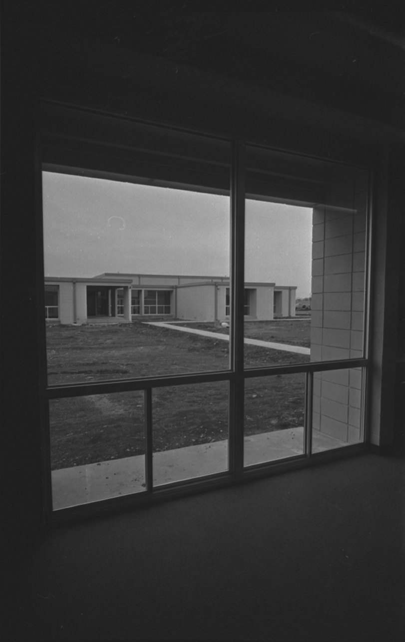 #55 Trinity Valley, new secondary school and gymnasium shown from window, 1969