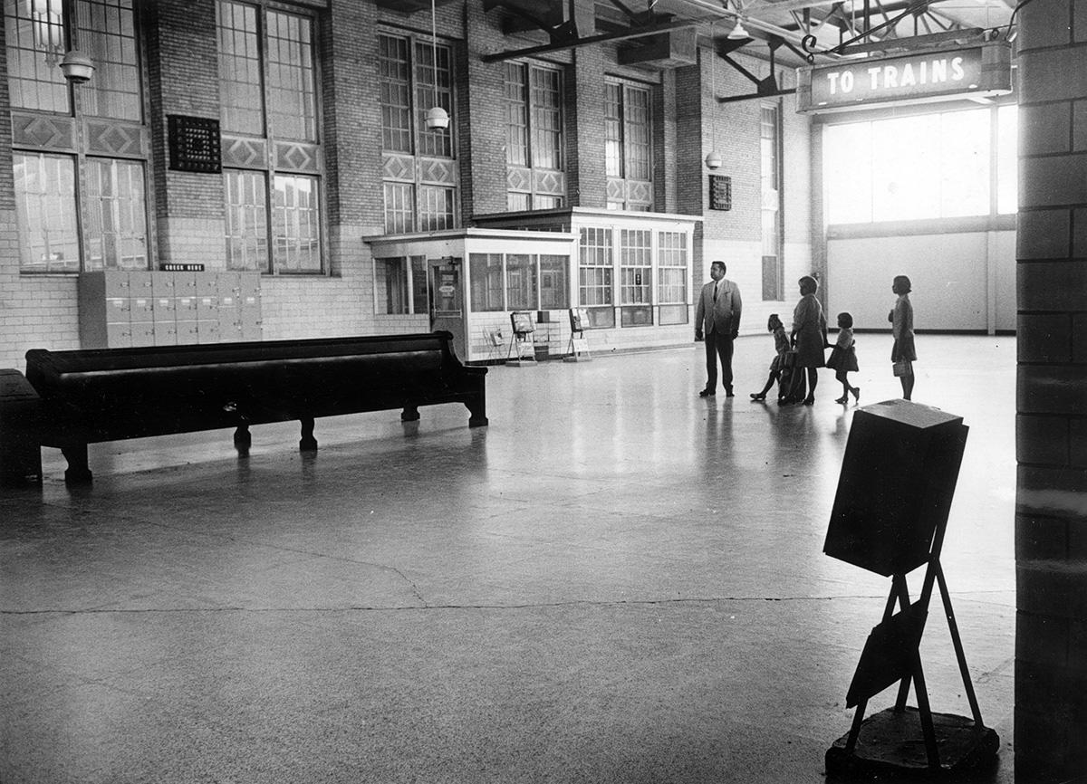 #39 Mr. and Mrs. B. T. Balcom and daughters on their way to board a train, 1969