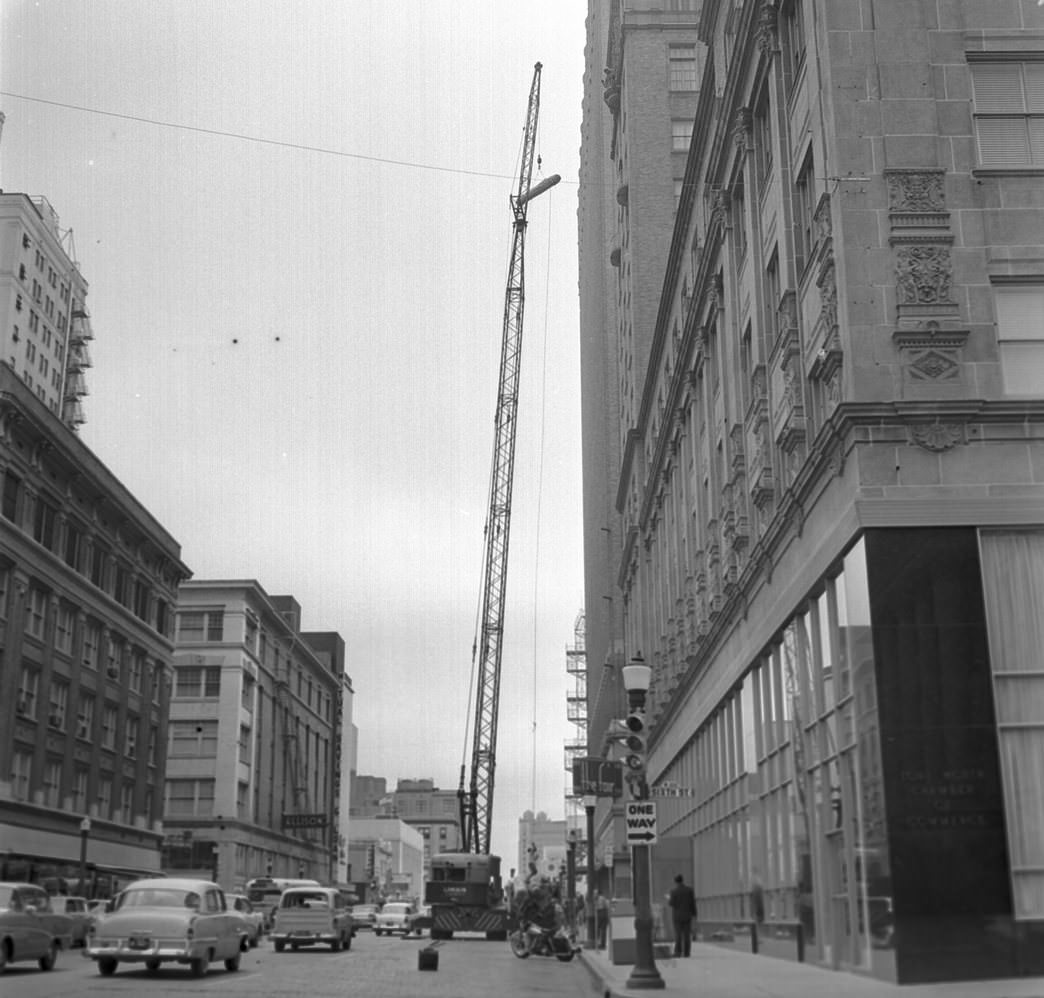 #90 Fort Worth Club remodeling, rugs being lifted to 12th floor, 1960