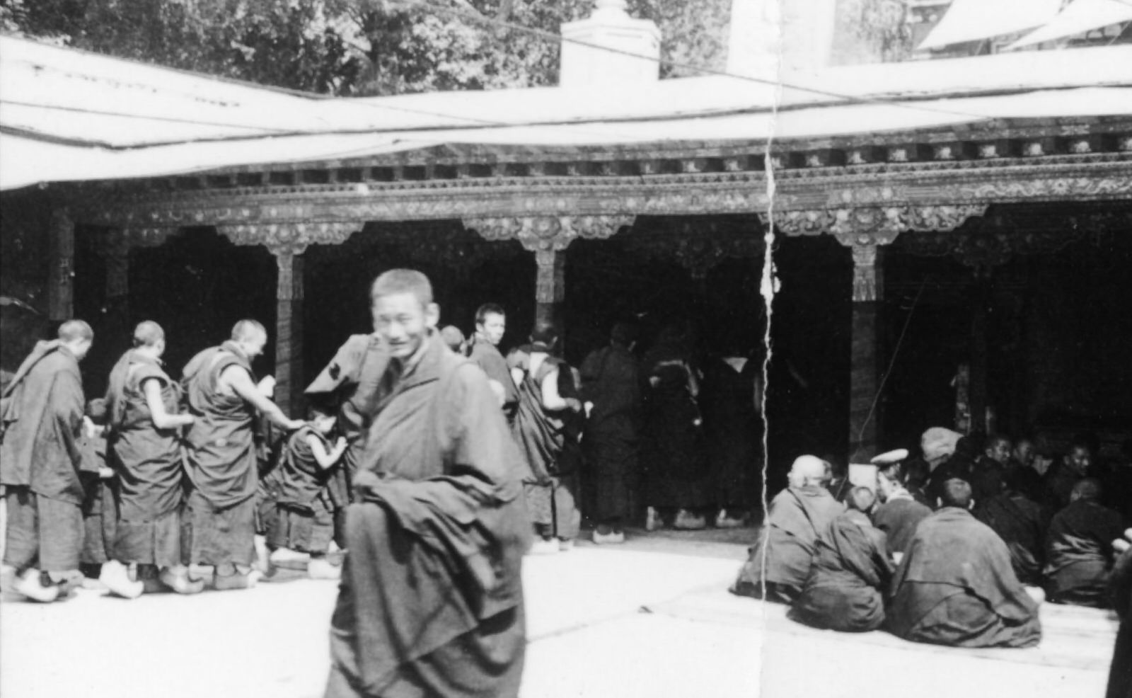 #52 Monks and Pilgrims Entering Dalai Lama’s Throne Room, 1944