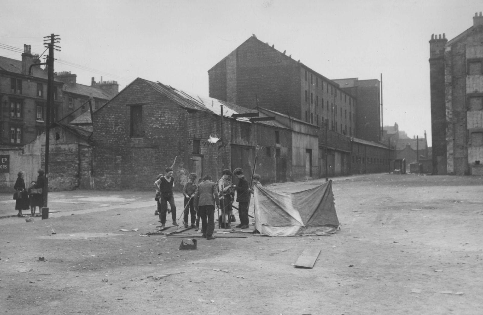 #24 Children playing in Surrey Lane in the Gorbals area of Glasgow, 1956