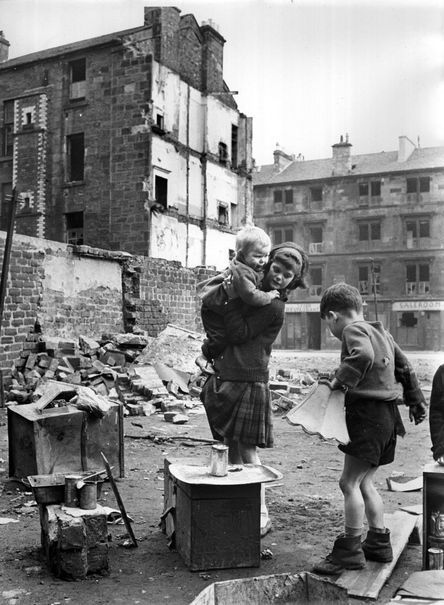 #85 Children playing in an area of slums under clearance in the Gorbals area of Glasgow, 1960