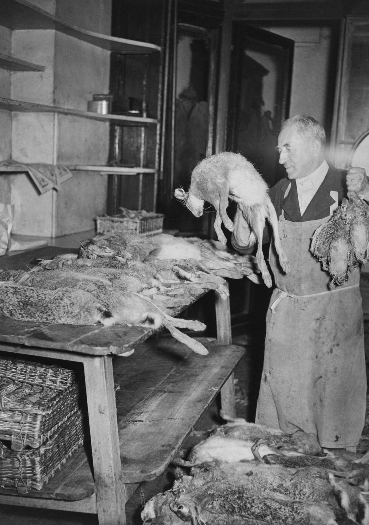 #109 Game stand at the Halles market in Paris in September 1947