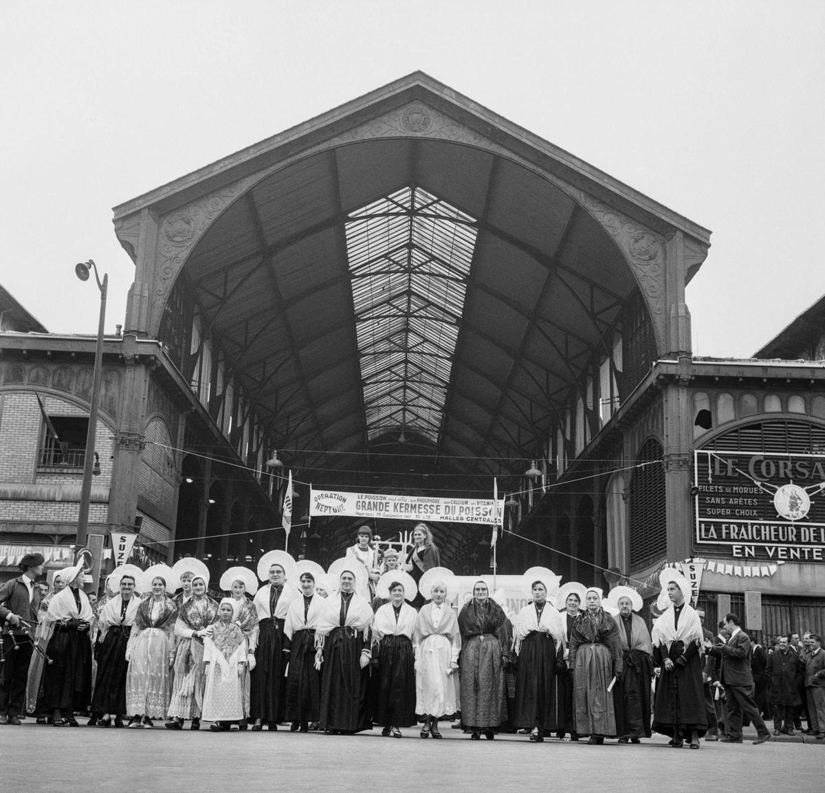 #99 Fishermen’s wives photographed in front of Les Halles for the great fish fair, in Paris, 1967