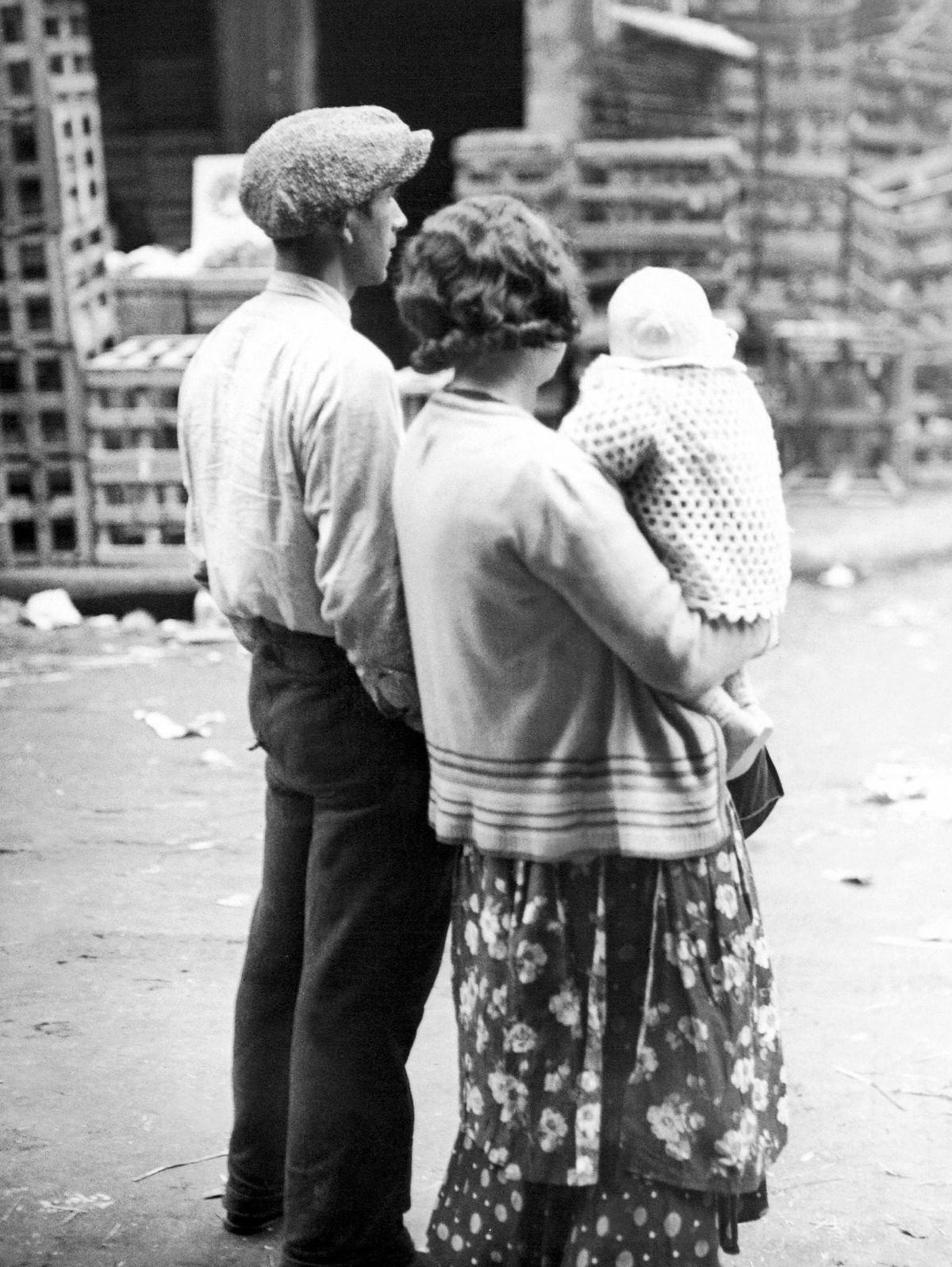 #48 Parisian family in the Les Halles district of Paris, France, 1930.