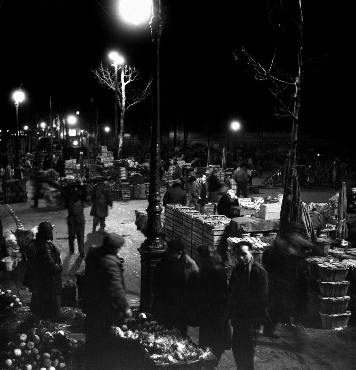 #10 Early in the morning in Les Halles, the traditional central market of Paris, in 1953