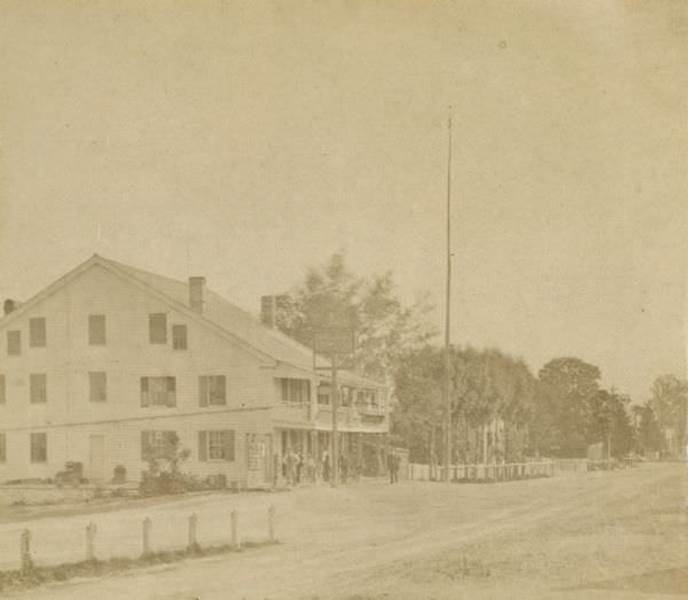 #16 View down road towards the Western Hotel on the left, 1870