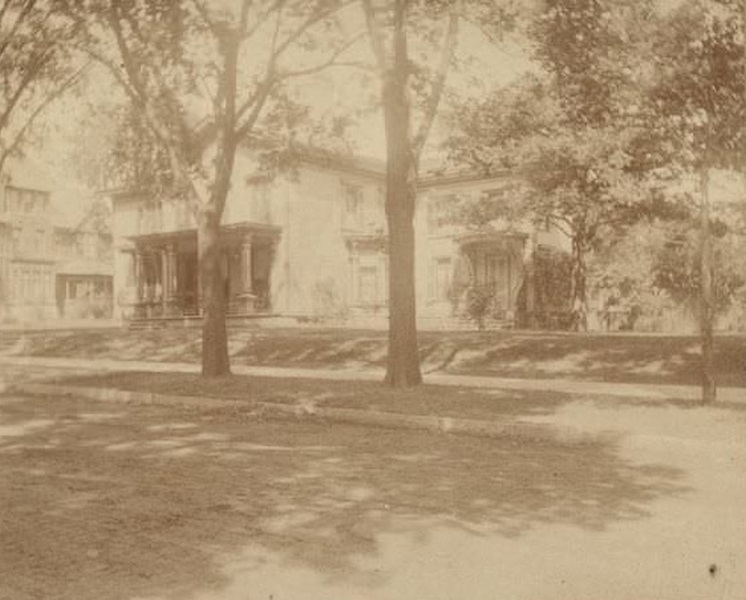 #40 A group of five young men and boys, all sons of George and Henriette Brandhorst Brumder, sitting on a bentwood settee, 1890
