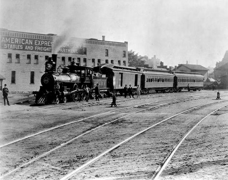 #59 View across railroad tracks of the Chicago, Milwaukee & St. Paul Railway engine #212, also known as the Waukesha Scoot, at Milwaukee’s Union Depot, 1894