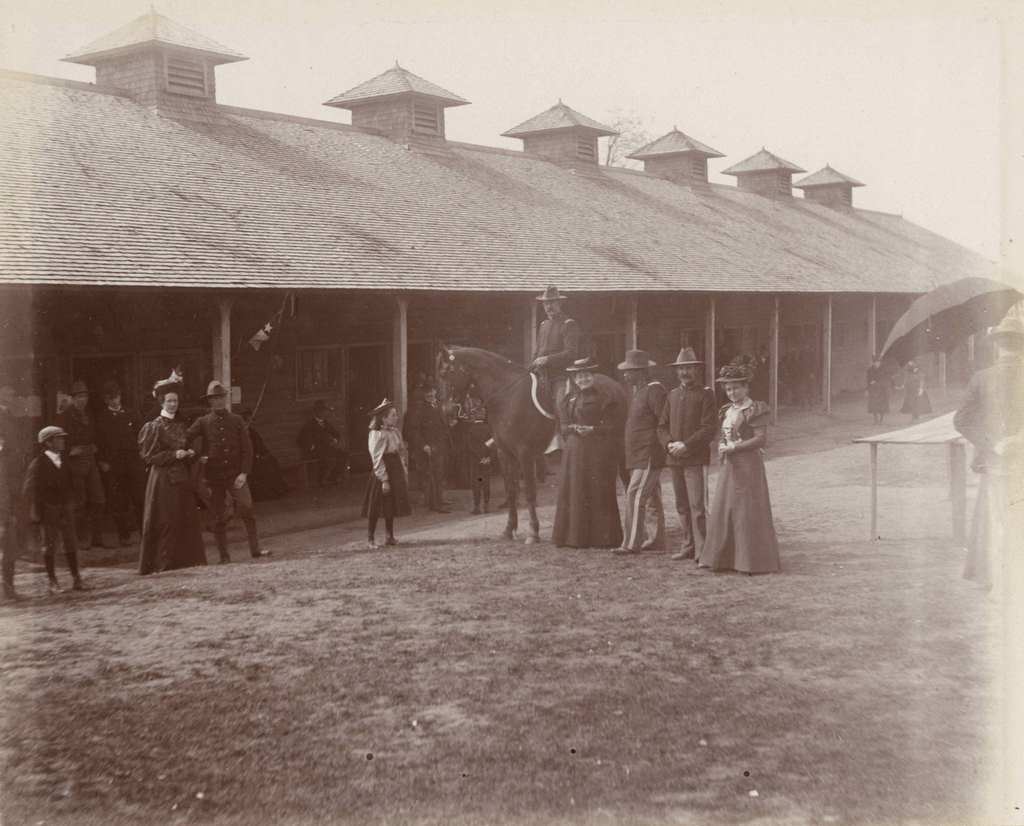 #125 Women and children visit soldiers at Camp Harvey, Milwaukee, Wisconsin, 1898.