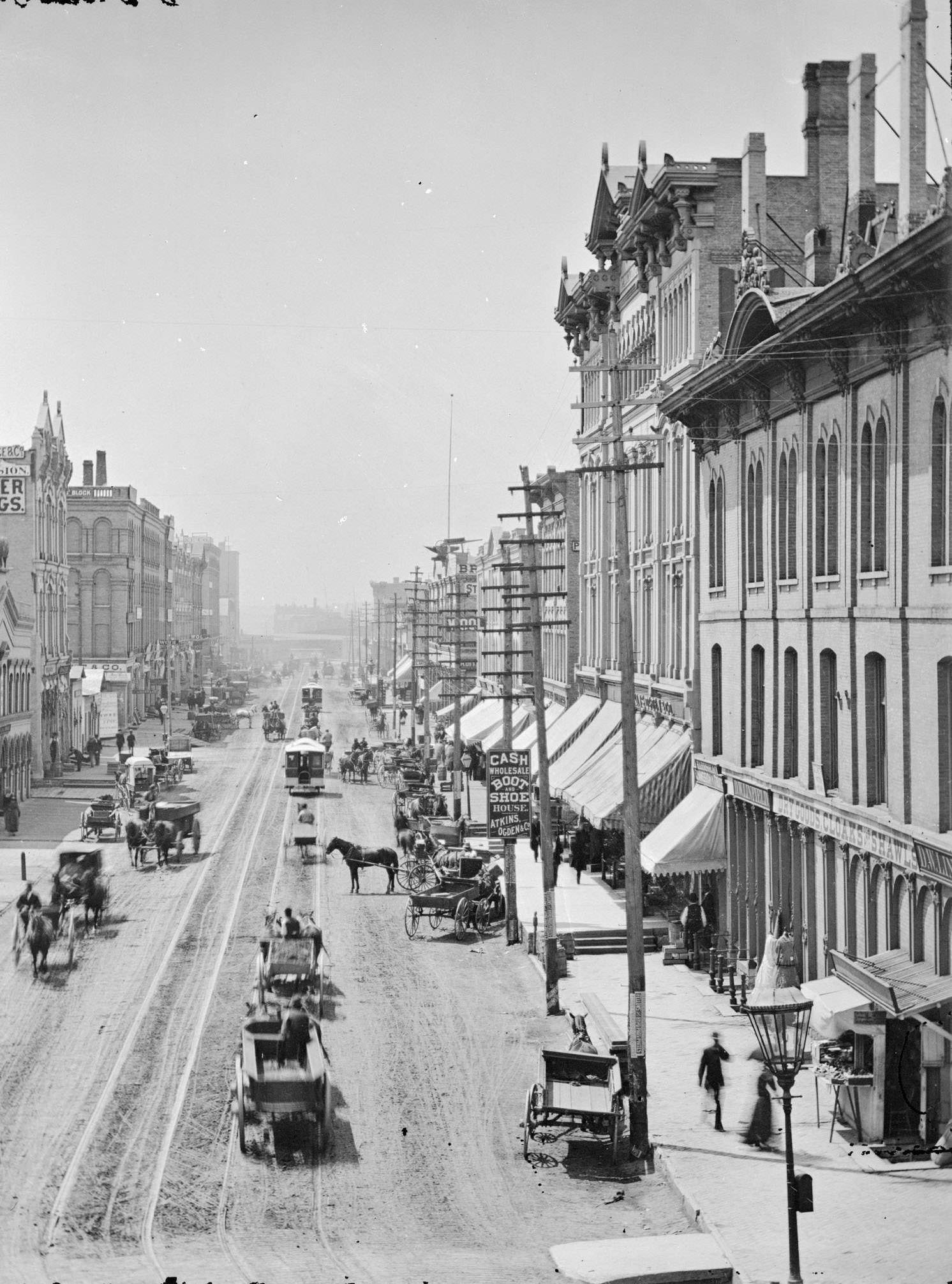 #73 Elevated view of buildings and street traffic, Milwaukee, Wisconsin, 1885.