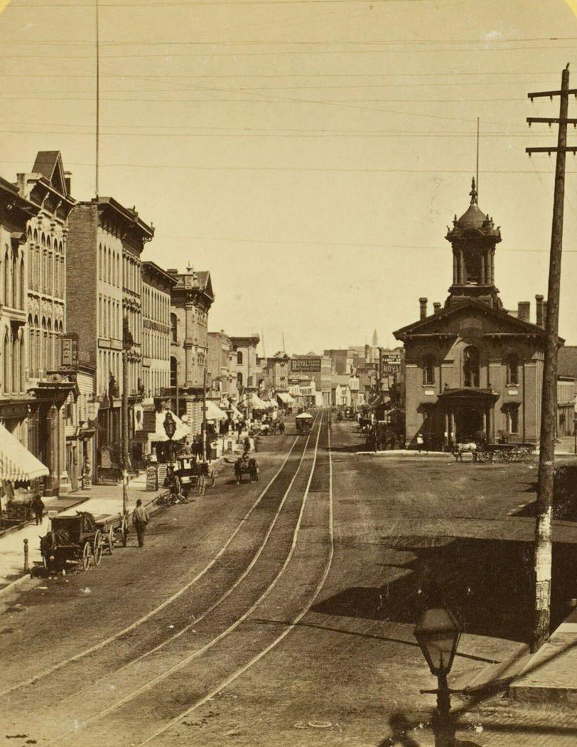 #74 Up East Water St. from the Kirby House, 1889
