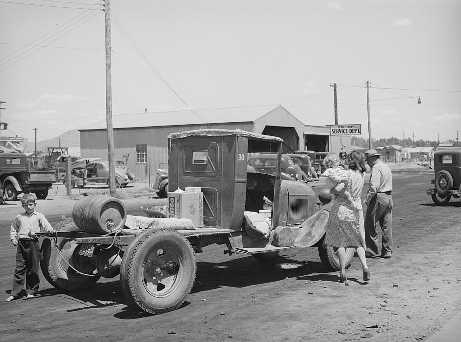 #130 Farmer with his truck loaded with goods which he has bought from the United Producers and Consumers Cooperative, Phoenix, Arizona, 1940