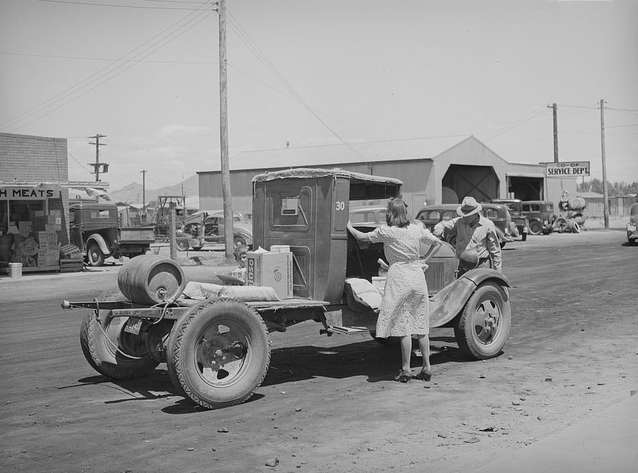 #112 Untitled photo, possibly related to: Farmer with his truck loaded with goods which he has bought from the United Producers and Consumers Cooperative, Phoenix, 1940