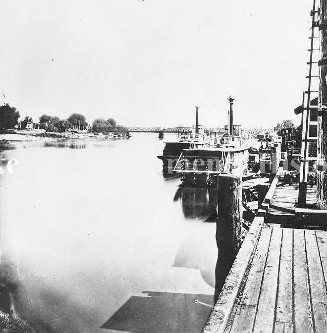 #8 Sacramento River waterfront with the river boats “Dora” and “Flora, 1880s