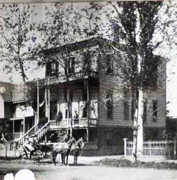 #85 Two story home with a horse and buggy in front, 1880s