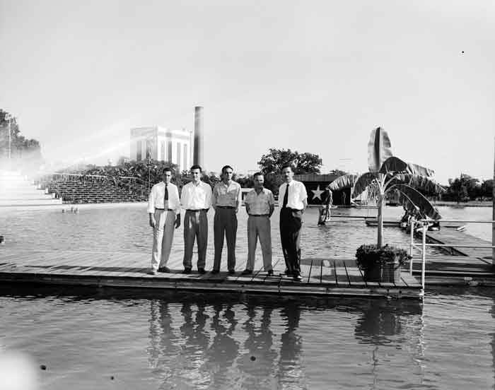 #52 Men on boardwalk on lake at Lone Star Brewing Company, 542 Simpson Street, 1955
