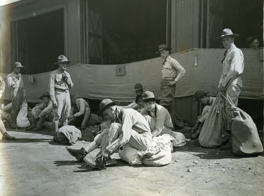 #123 A section of the student army at Jefferson Barracks donning campaign uniforms, 1932.