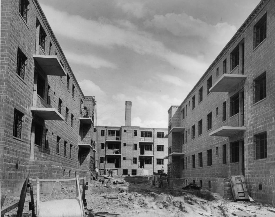 #87 Exterior of Neighborhood Gardens Apartments. Construction is nearing completion, 1930