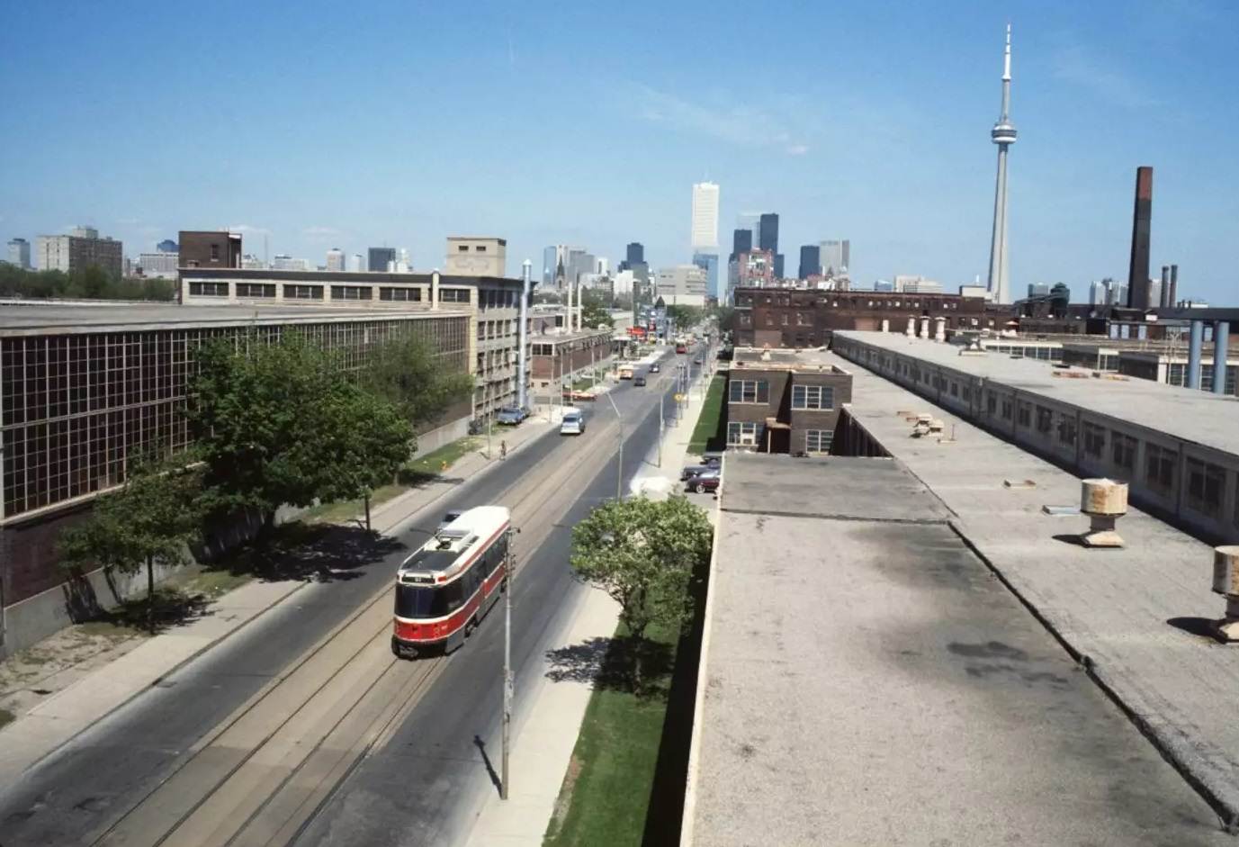 #52 Looking across the Massey Ferguson lands on King West, 1980s