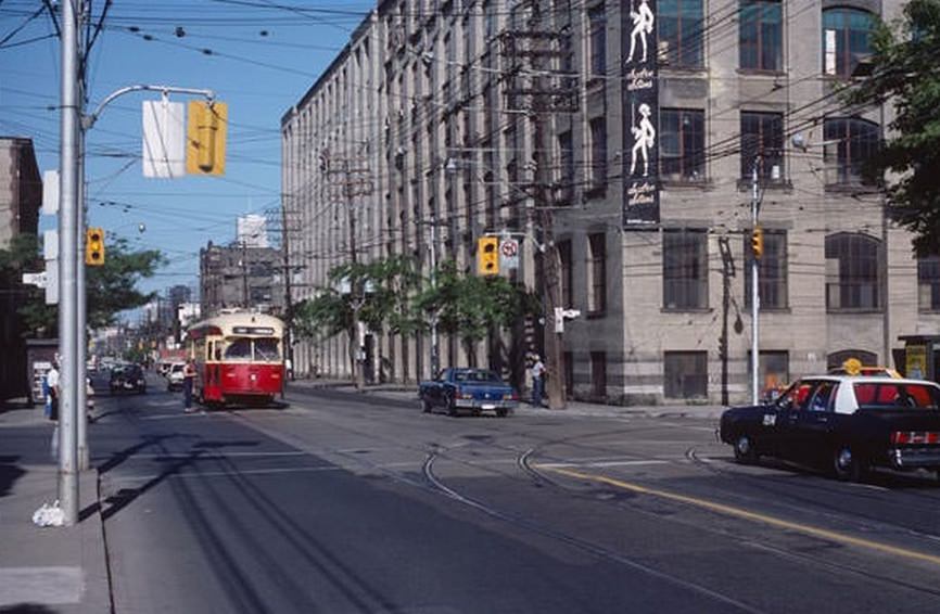 #125 Queen and Shaw, looking east, June 6, 1981.