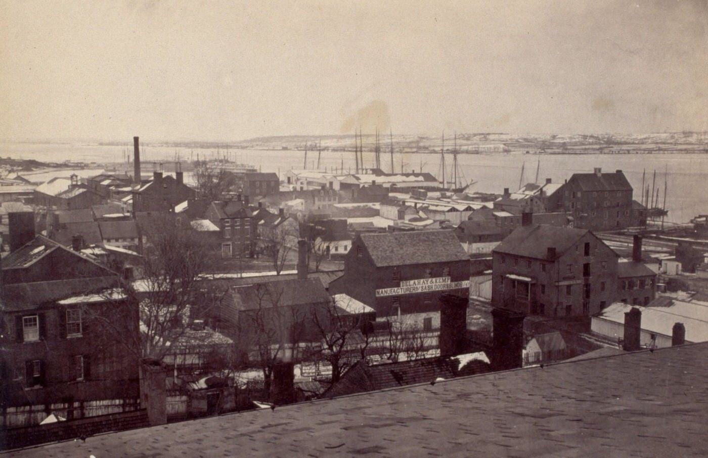 #107 A winter view of Alexandria, Virginia, with Washington visible across the Potomac River, 1864