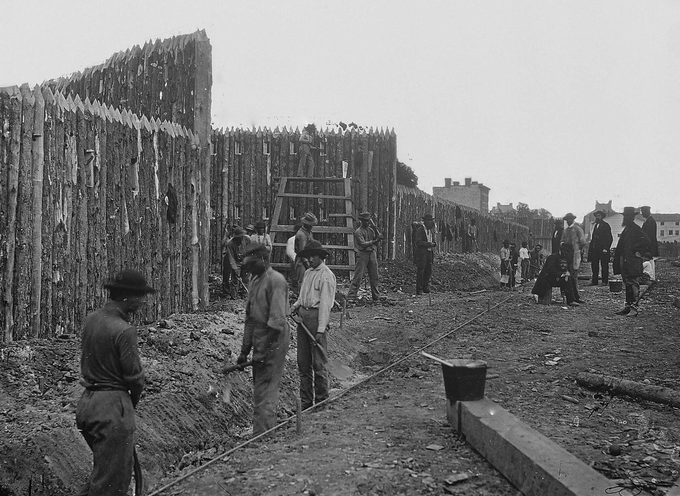 #152 Workers build fortifications and barricades, Alexandria, Virginia, 1860s.