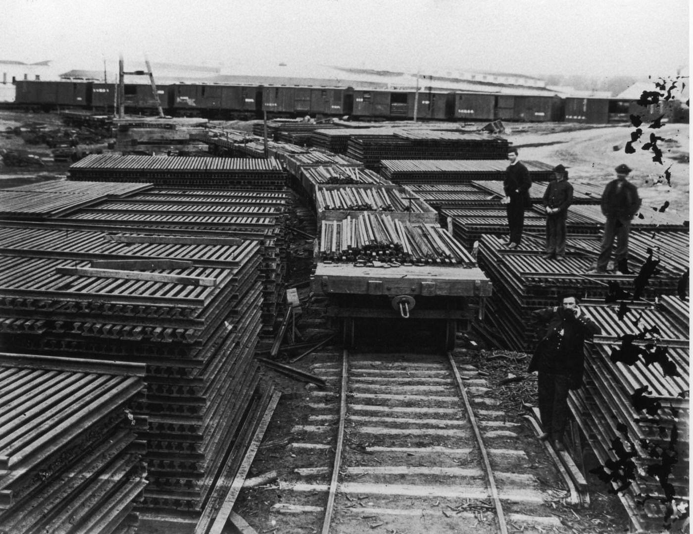 #156 A US Military Rail Road (USMRR) yard full of rails to maintain Federal rail lines during the American Civil War, at Alexandria, Virginia, 1860