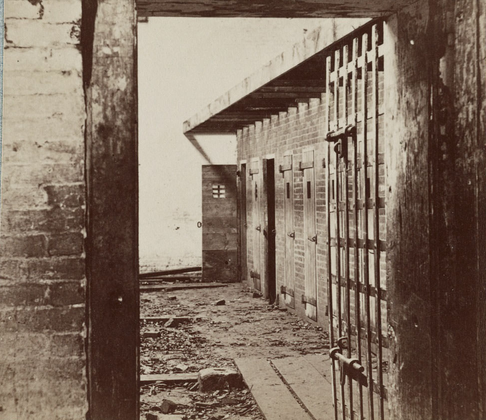 #20 Interior view of a slave pen, showing the doors of cells where the slaves were held before being sold. Building address: 1315 Duke Street, Alexandria, 1862